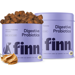 Two purple containers of Finn Digestive Probiotics supplements - one peanut butter flavor with spilled brown chews, one plain flavor