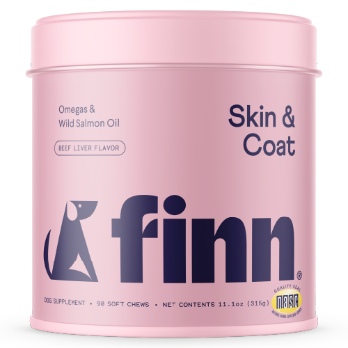 Pink cylindrical container of Finn dog supplements for skin and coat with beef liver flavor, featuring a dog silhouette logo