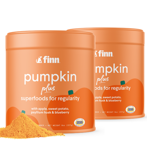 Two orange containers of Finn Pumpkin Plus superfood powder for regularity, with pumpkin graphics and yellow powder visible