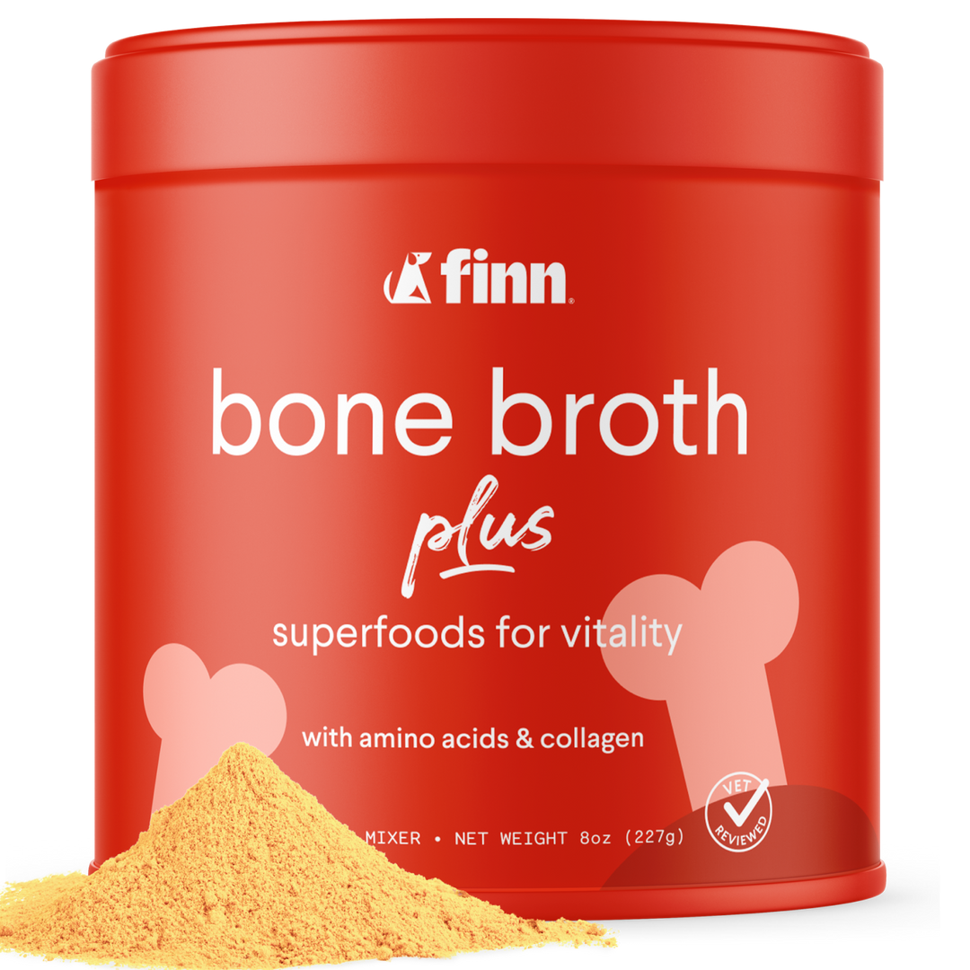 Red container of Finn bone broth plus with yellow powder on a white background