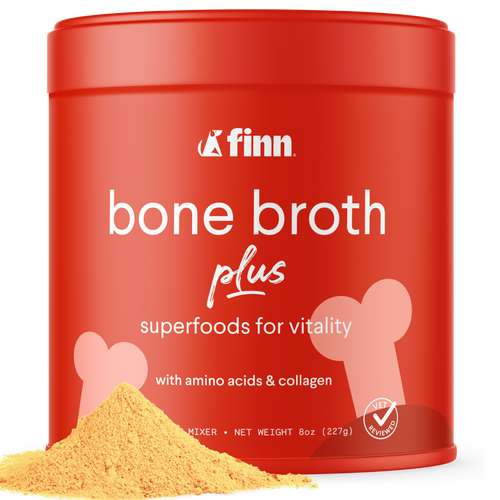 Red container of Finn bone broth plus with yellow powder on a white background