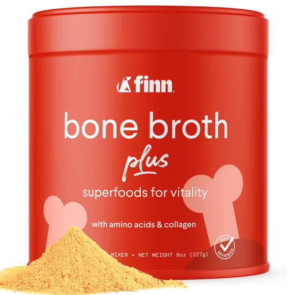Red container of Finn bone broth plus with yellow powder on a white background
