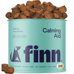 Finn Calming Aid supplement can with dog treats on a white background