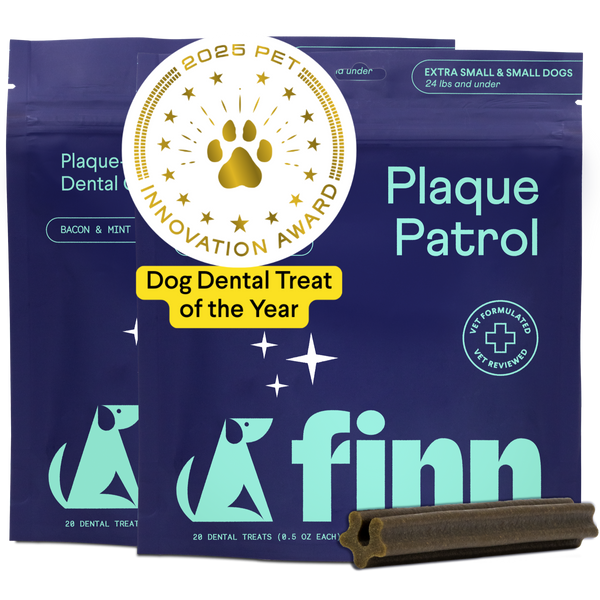 Purple packaging for Finn Plaque Patrol dog dental treats with gold award seal, featuring two packages and a brown dental chew stick for small dogs