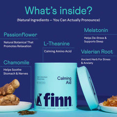 Finn Calming Aid supplement container with natural ingredients labeled around it including passionflower, chamomile, L-theanine, melatonin, and valerian root on blue background