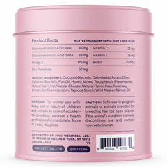 Pink cylindrical container showing supplement facts label with omega-3, vitamins, and active ingredients for animal use