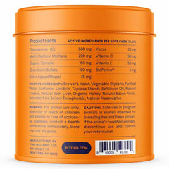 Orange pet supplement container showing product facts label with active ingredients including glucosamine, turmeric, and vitamins
